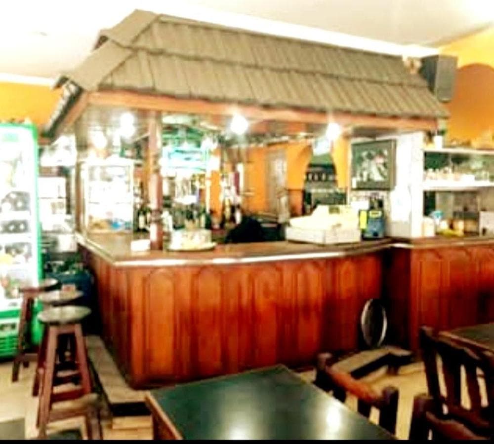BUSINESS FOR SALE: BAR AND RESTAURANT ACROSS FROM THE UNIVERSITY