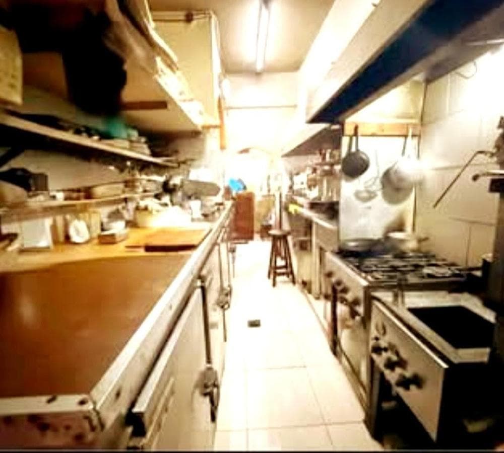 BUSINESS FOR SALE: BAR AND RESTAURANT ACROSS FROM THE UNIVERSITY