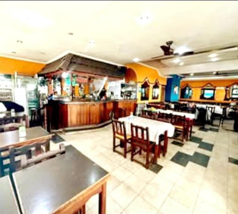 BUSINESS FOR SALE: BAR AND RESTAURANT ACROSS FROM THE UNIVERSITY