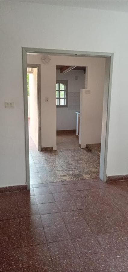 APARTMENT BUILDING WITH COMMERCIAL SPACES