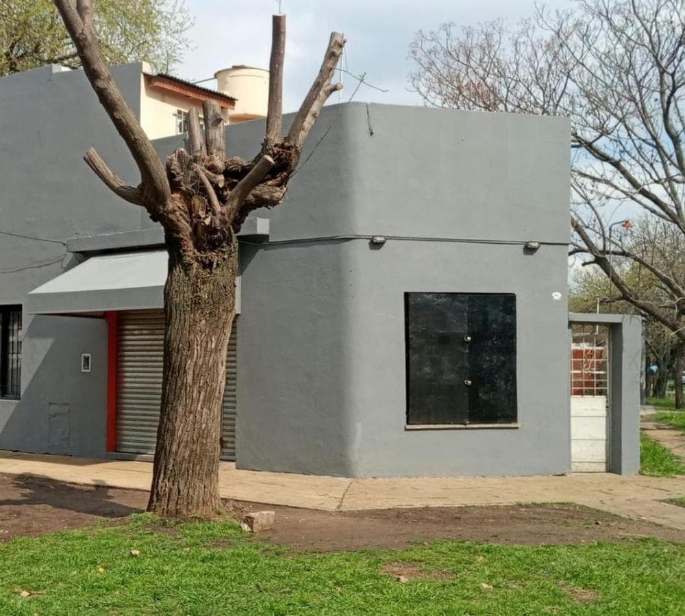 APARTMENT BUILDING WITH COMMERCIAL SPACES