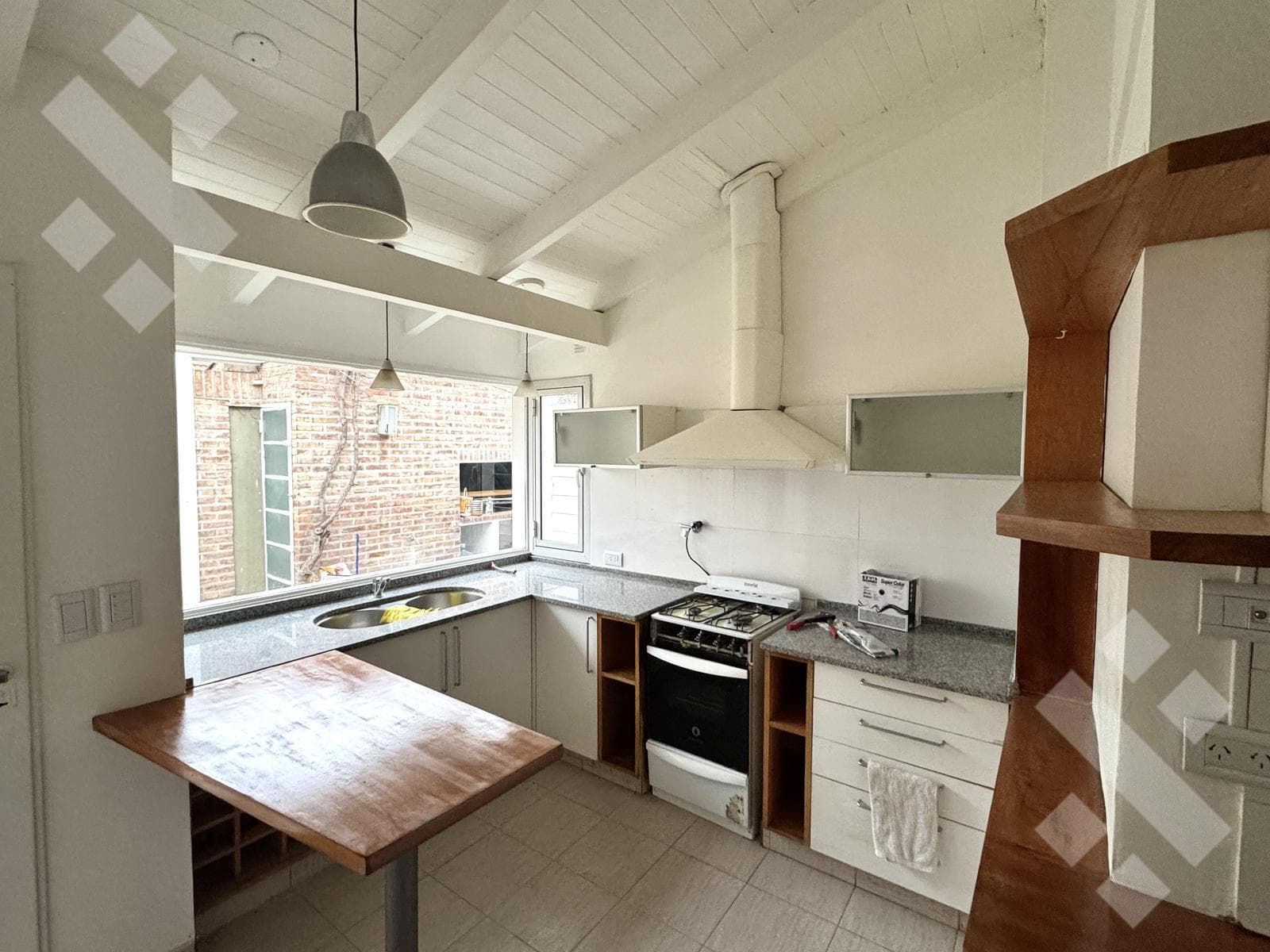 FOR RENT: 4-bedroom house with patio and grill