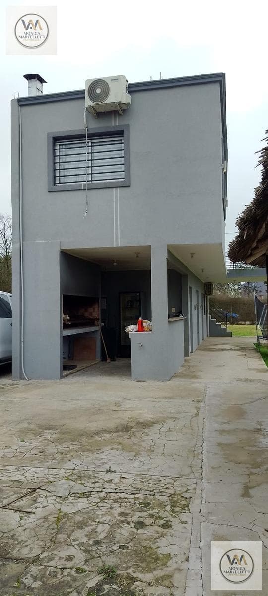 Lot with a loft, outdoor kitchen, grill, and pool