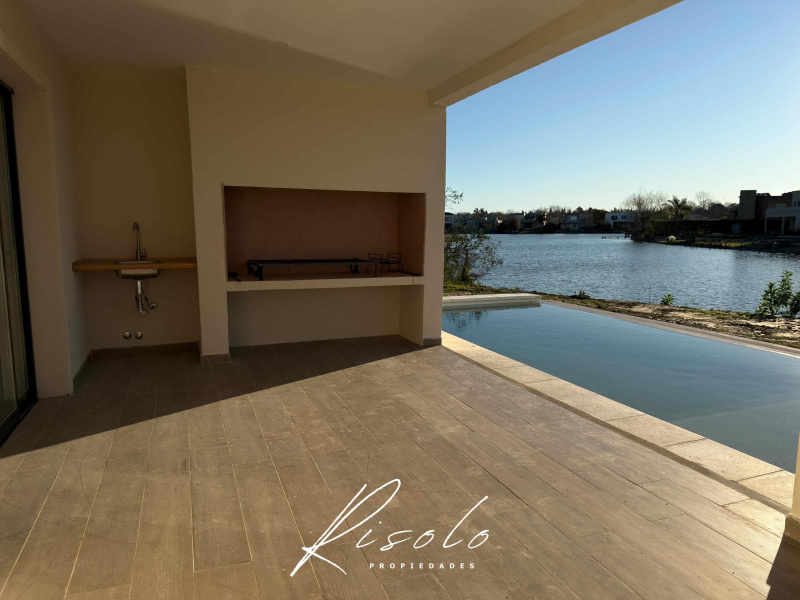 House for Sale with a Lot Overlooking the Lagoon. 3 Bedrooms, Pool. Gated Community, Escobar