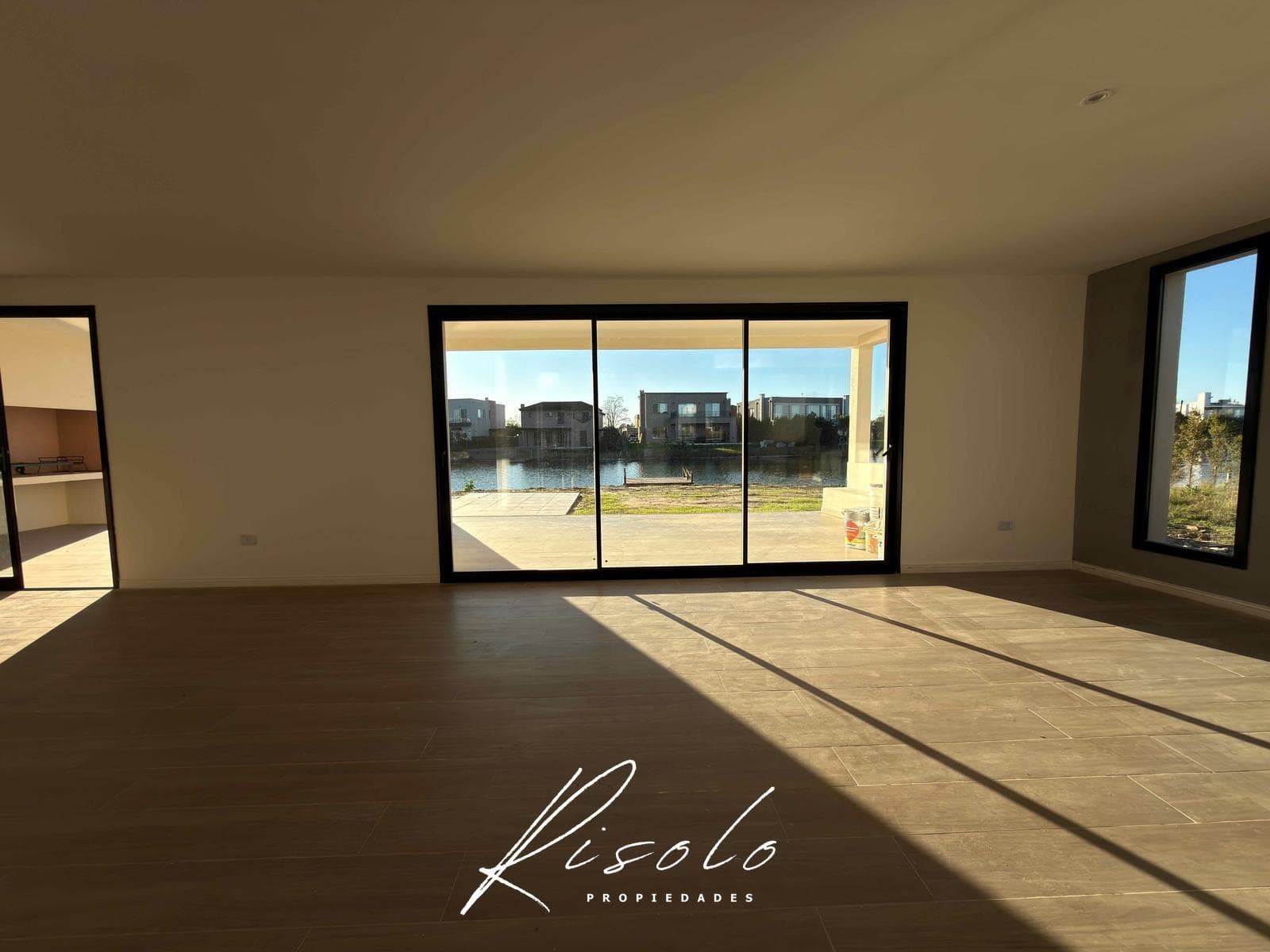 House for Sale with a Lot Overlooking the Lagoon. 3 Bedrooms, Pool. Gated Community, Escobar