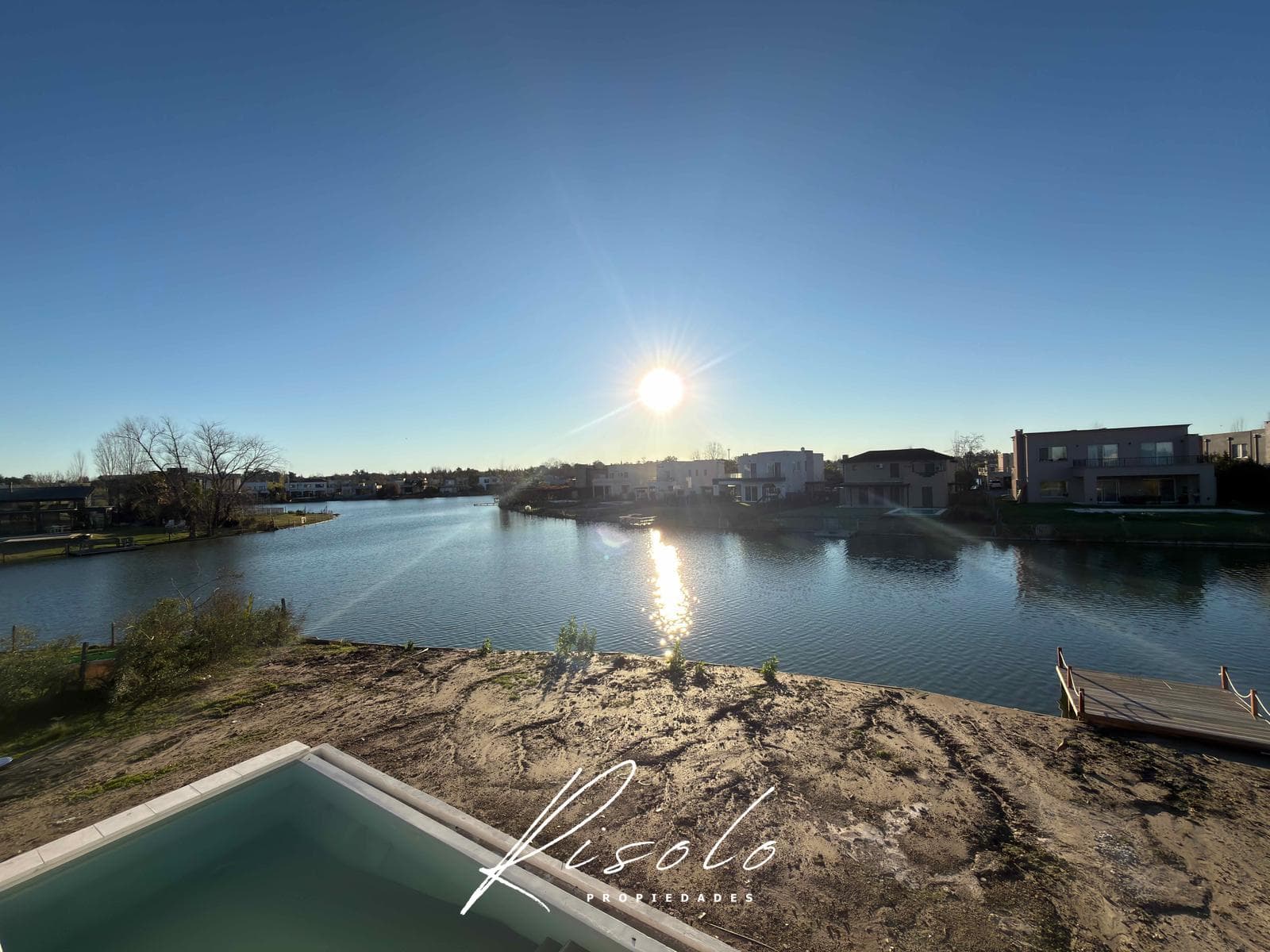 House for Sale with a Lot Overlooking the Lagoon. 3 Bedrooms, Pool. Gated Community, Escobar