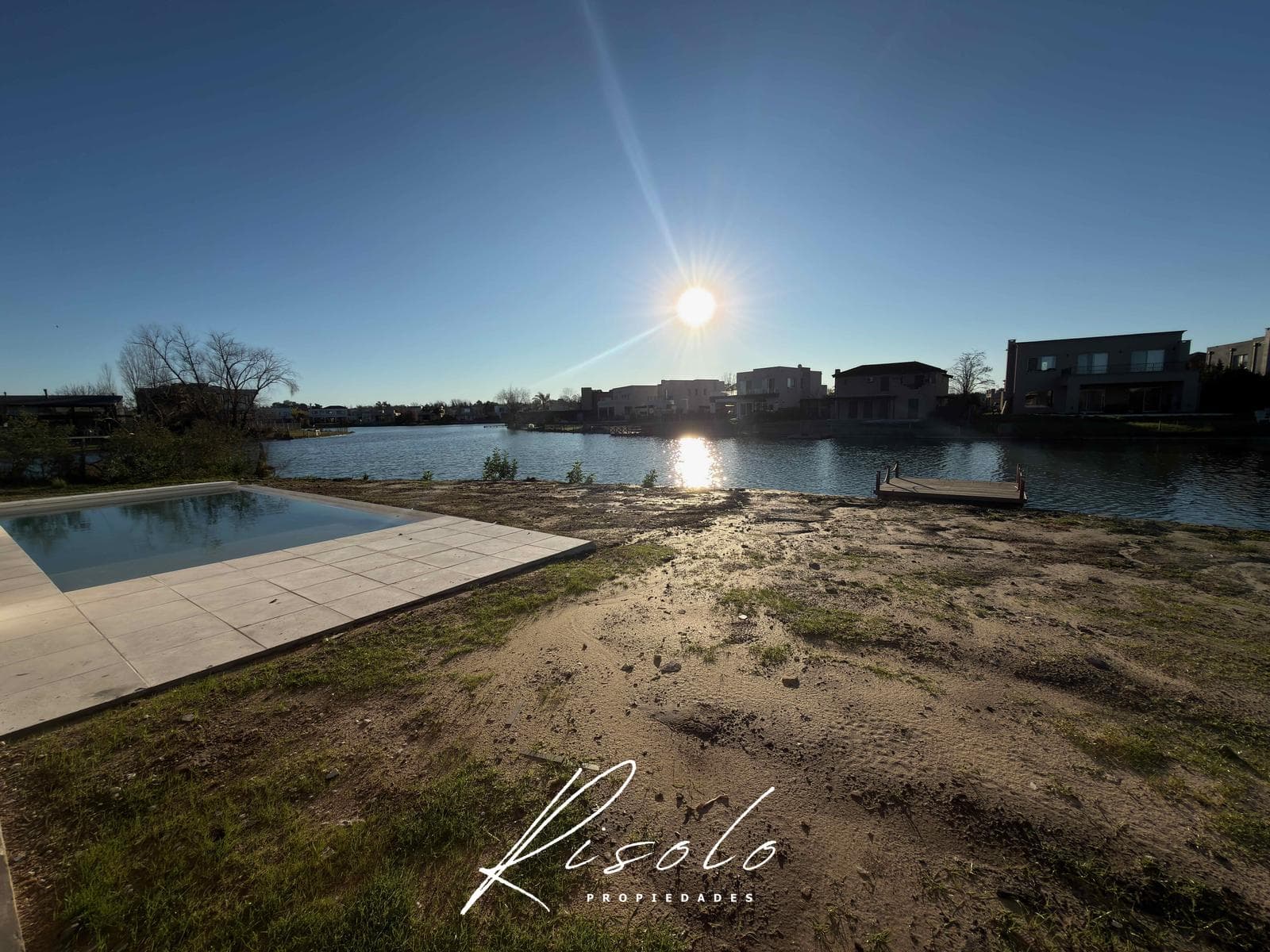 House for Sale with a Lot Overlooking the Lagoon. 3 Bedrooms, Pool. Gated Community, Escobar