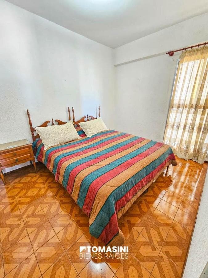 TWO ROOMS ON THE SIDE WITH A BALCONY AND A VIEW OF THE CITY
