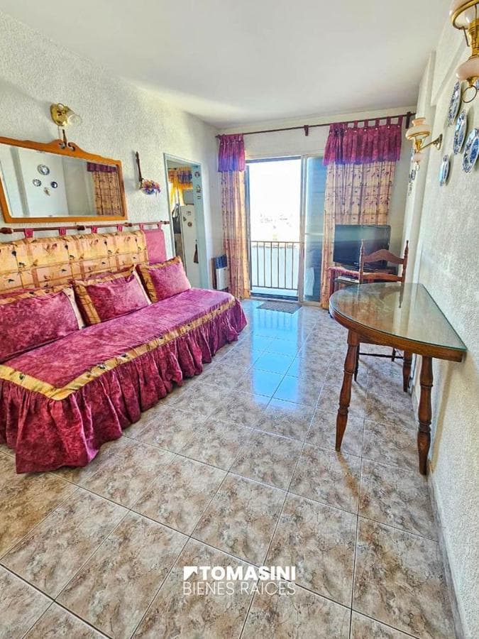 TWO ROOMS ON THE SIDE WITH A BALCONY AND A VIEW OF THE CITY