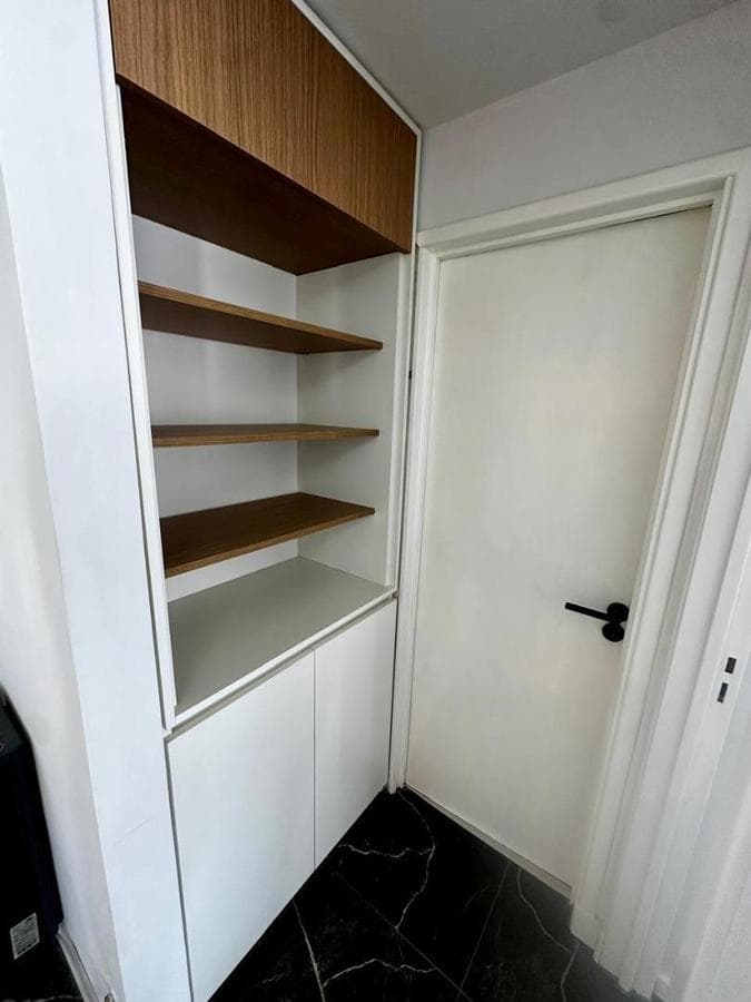 TWO OPEN-CONCEPT ROOMS FACING EACH OTHER WITH A FRENCH BALCONY