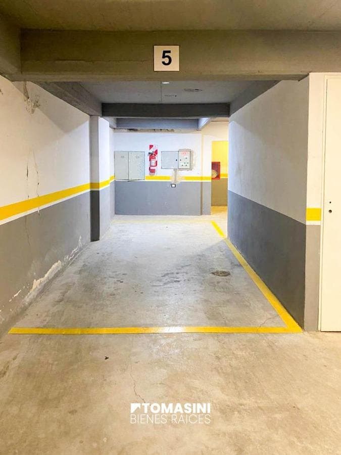 COVERED PARKING SPACE, ACCESS VIA FREIGHT ELEVATOR
