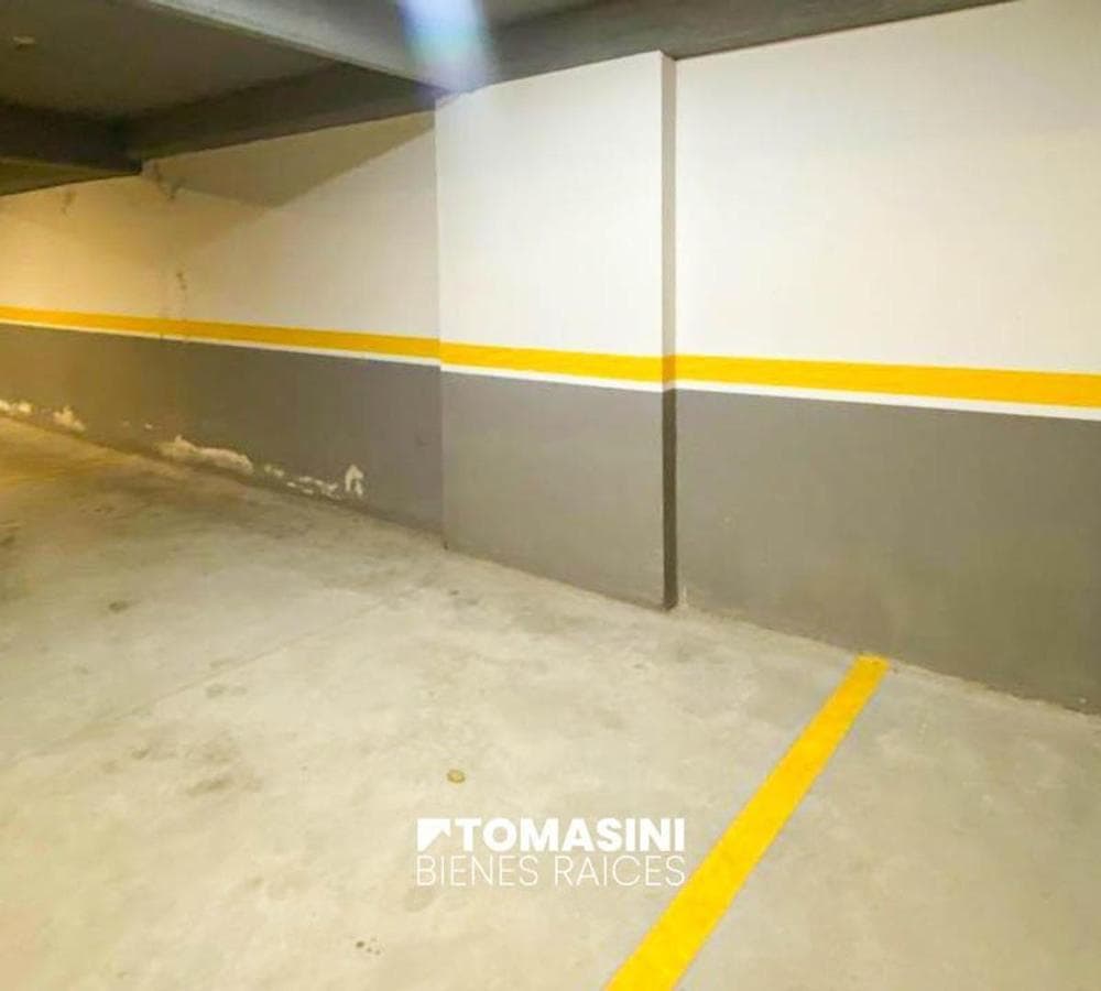 COVERED PARKING SPACE, ACCESS VIA FREIGHT ELEVATOR