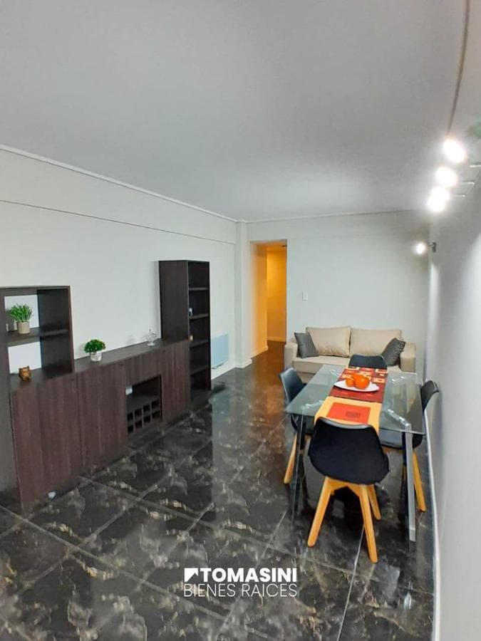 TWO ROOMS ON THE FRONT WITH A BALCONY AND A SERVICE ROOM.