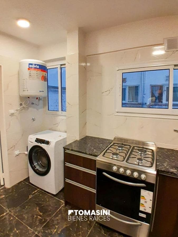 TWO ROOMS ON THE FRONT WITH A BALCONY AND A SERVICE ROOM.