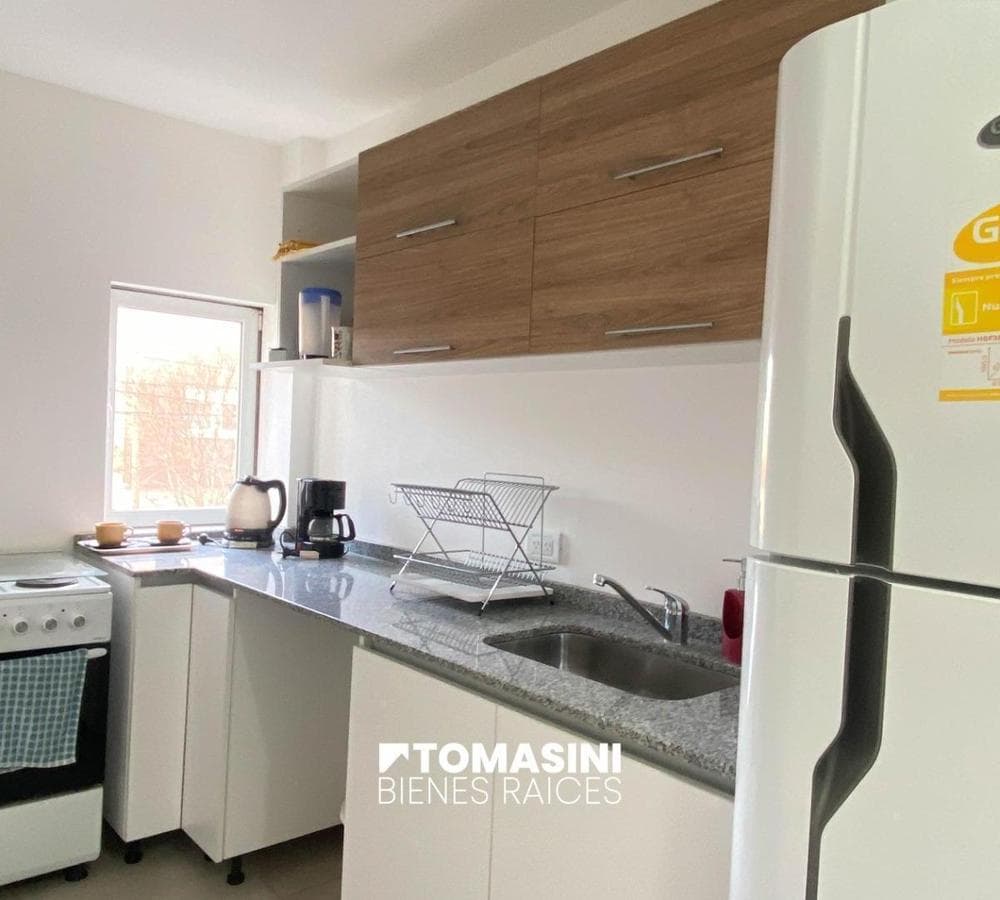 TWO 2-ROOM APARTMENTS + COMMERCIAL SPACE AND PARKING SPACES