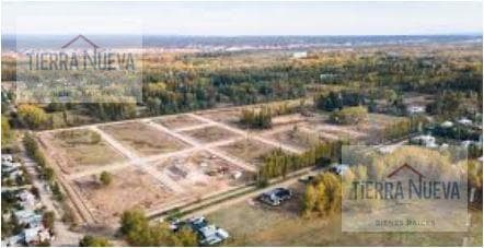 LAND IN PLOTTIER