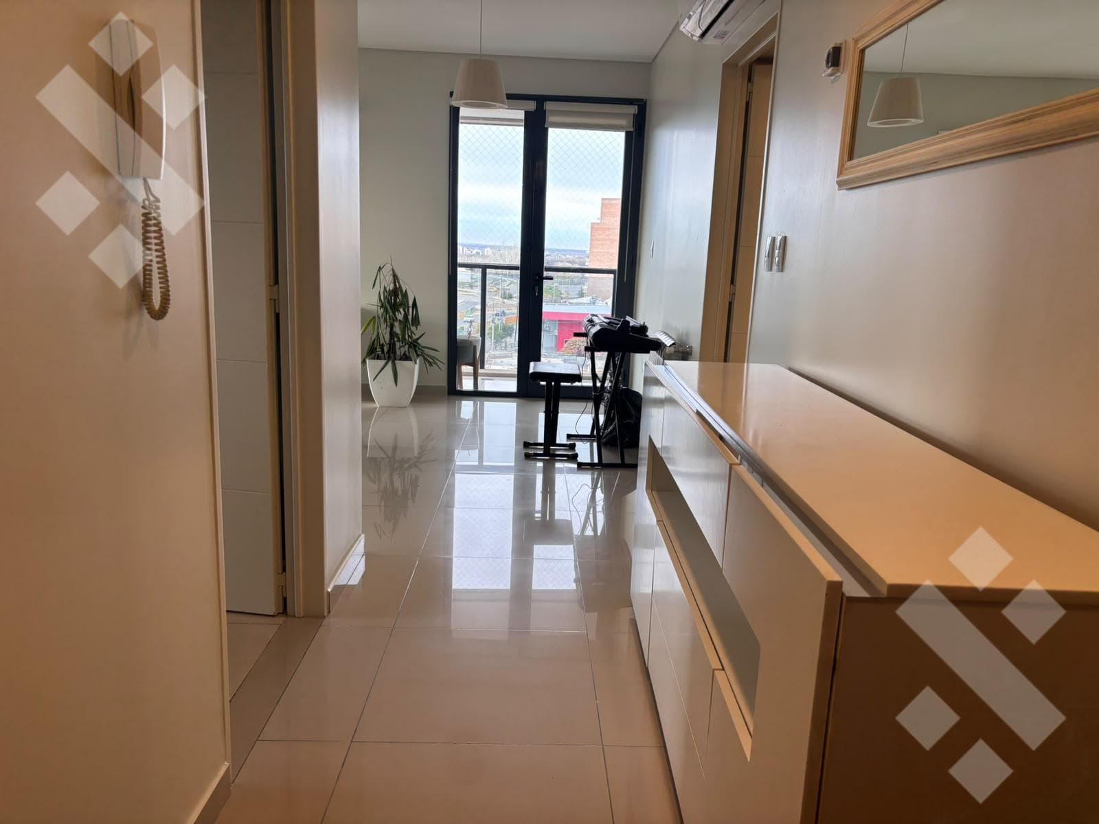 FURNISHED 2-BEDROOM APARTMENT FOR RENT WITH GARAGE IN THE GEMMA II BUILDING - LELOIR AND ENTRE RIOS