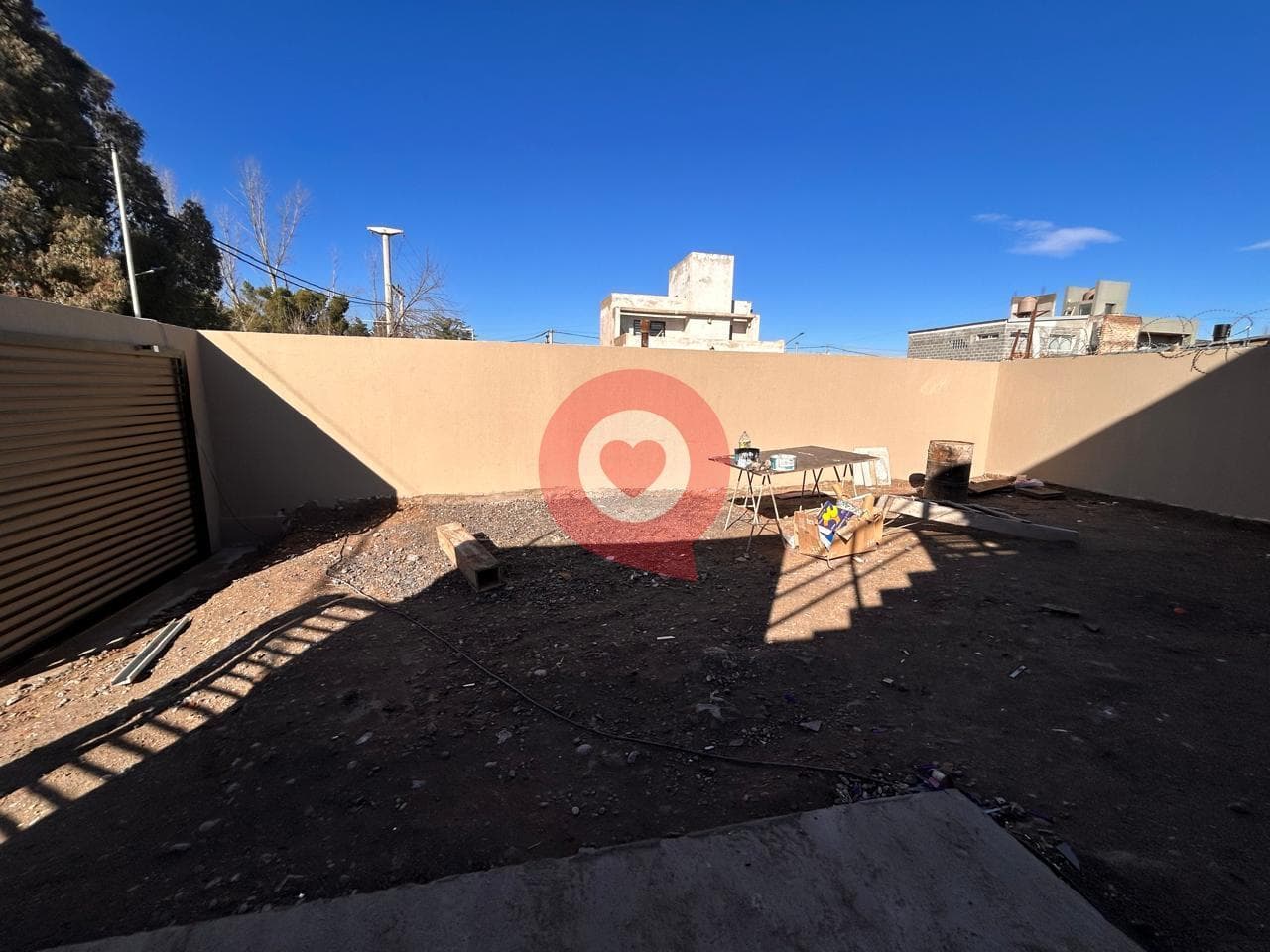 For Sale: 2 commercial properties and two 1-bedroom apartments with a garage