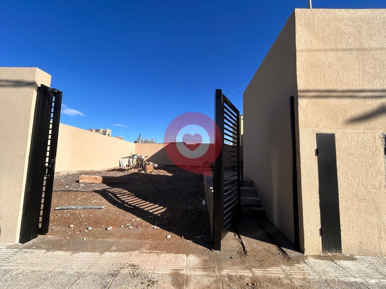 For Sale: 2 commercial properties and two 1-bedroom apartments with a garage