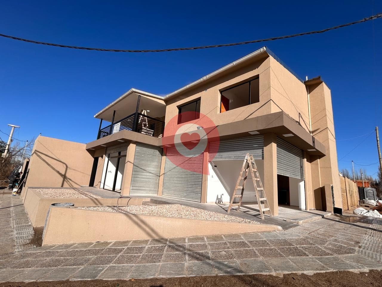 For Sale: 2 commercial properties and two 1-bedroom apartments with a garage