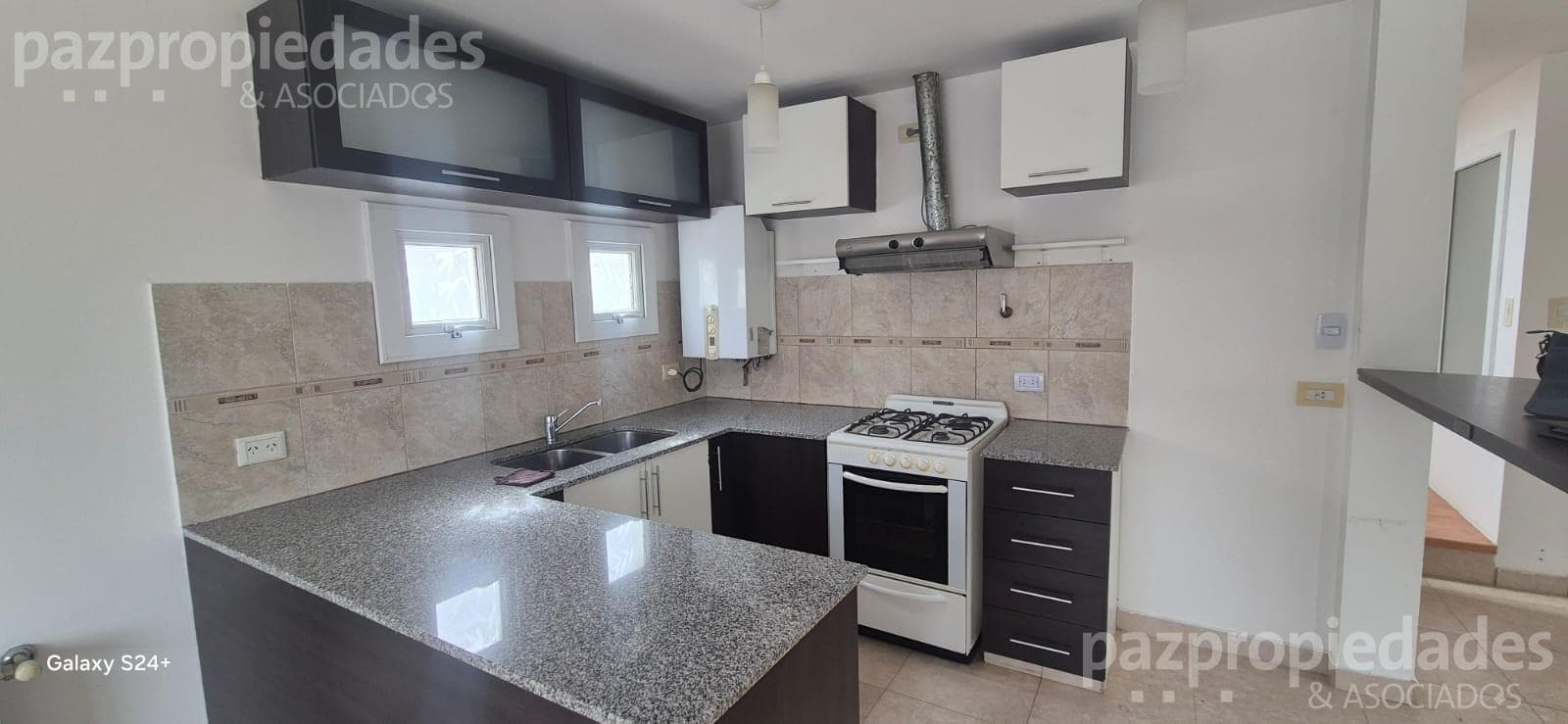 2-Bedroom Apartment for Rent with Garage, Balcony, and Barbecue