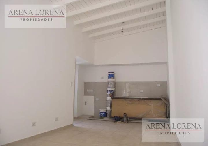 3-Room Home for Sale with a Patio and a Double Drive-Through Garage