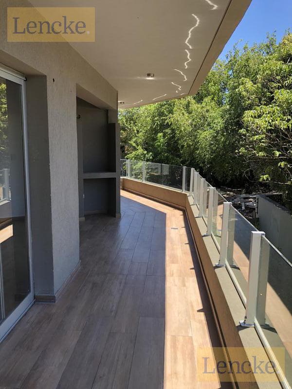 For sale with rental income: excellent 2-bedroom apartment with a balcony/terrace, barbecue, and garage