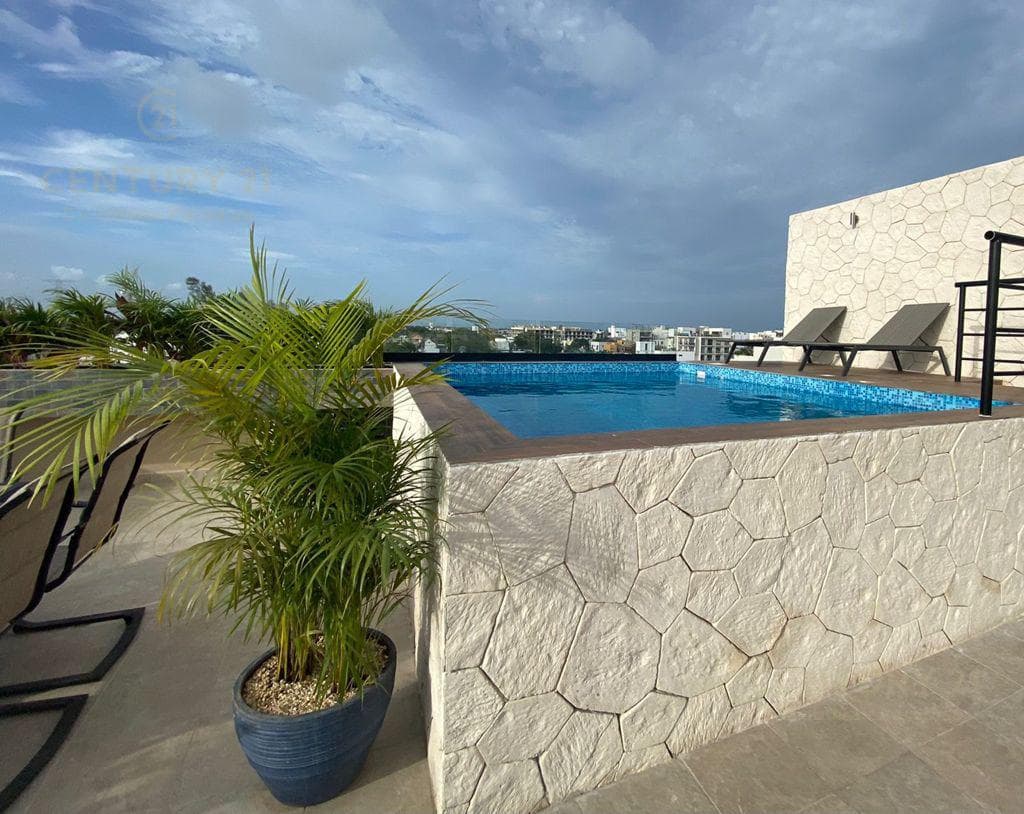 Departamento en torre condo en el centro de Playa del Carmen P2998