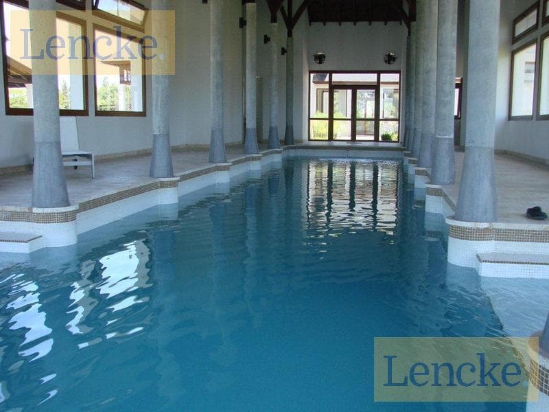 Lot for sale by the river with a boat slip in the Albanueva gated community, north-facing lot