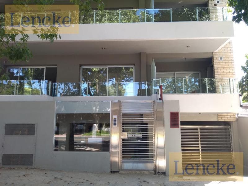 For sale with rental income: excellent 2-bedroom apartment with a balcony/terrace, barbecue, and garage