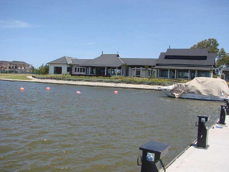 Lot for sale by the river with a boat slip in the Albanueva gated community, north-facing lot